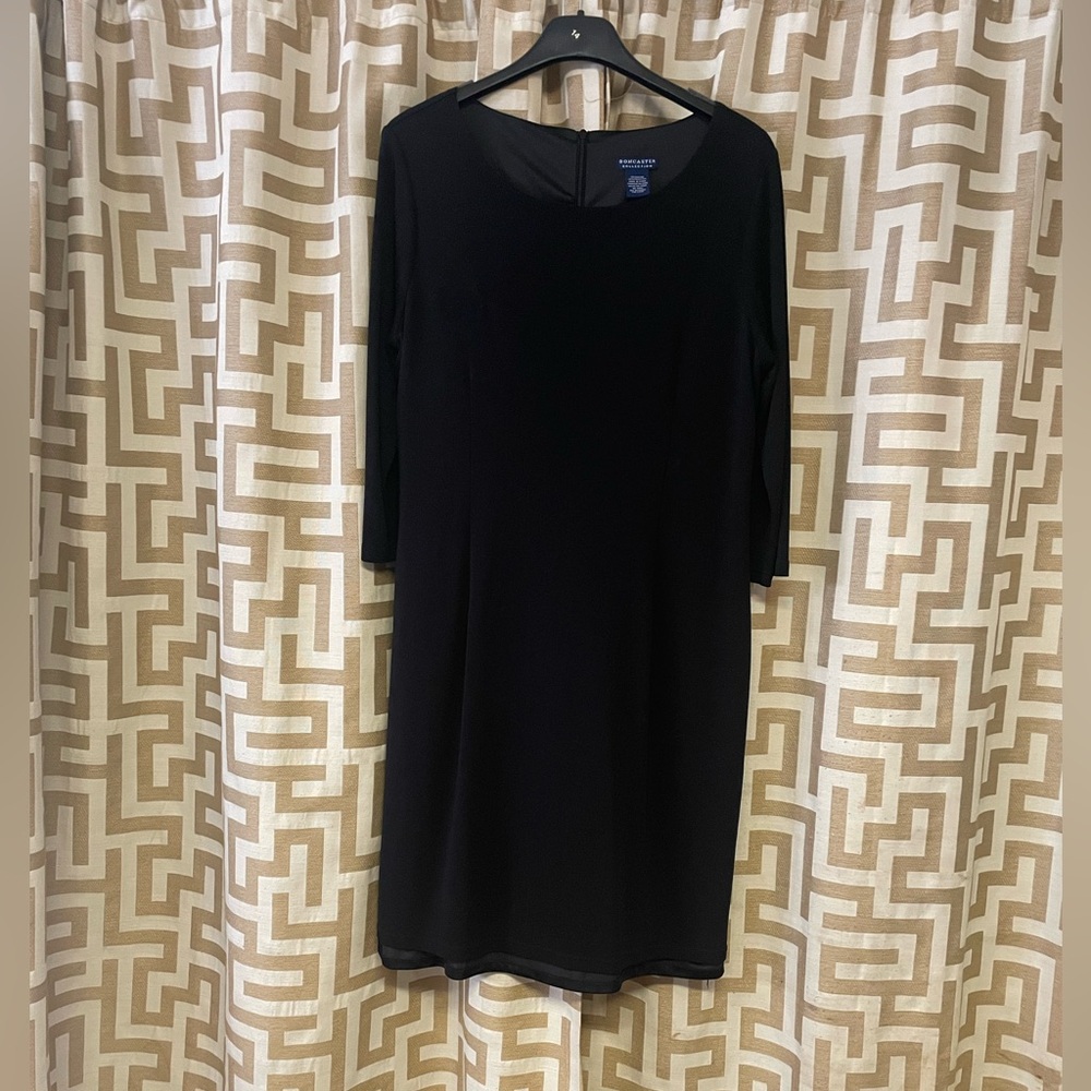 Sleek, lined black dress.